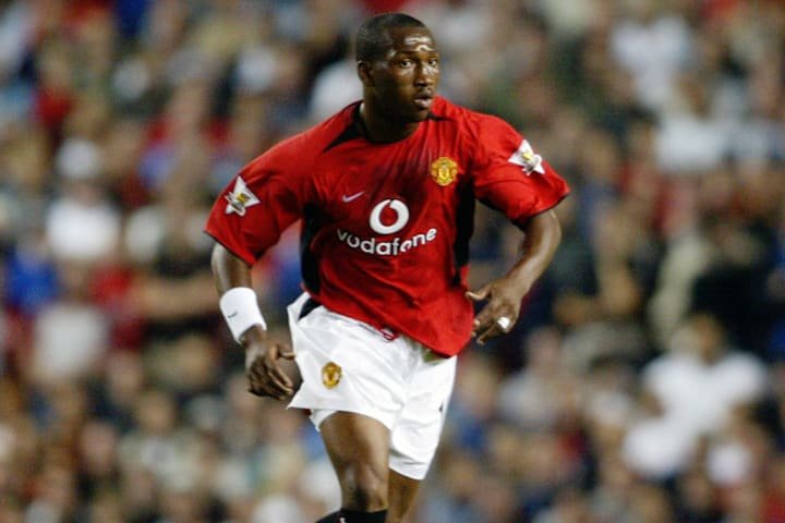 Eric Djemba-Djemba of Manchester United running with the ball Eric Djemba-Djemba of Manchester United running with the ball