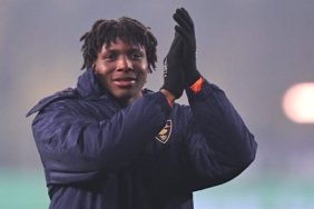 Patrick Dorgu salute Lecce's travelling fans after Friday night's victory over Parma