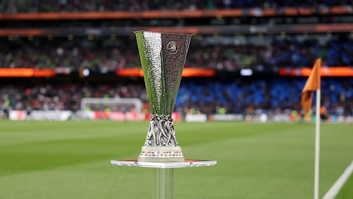 Who will lift the Europa League trophy next month?